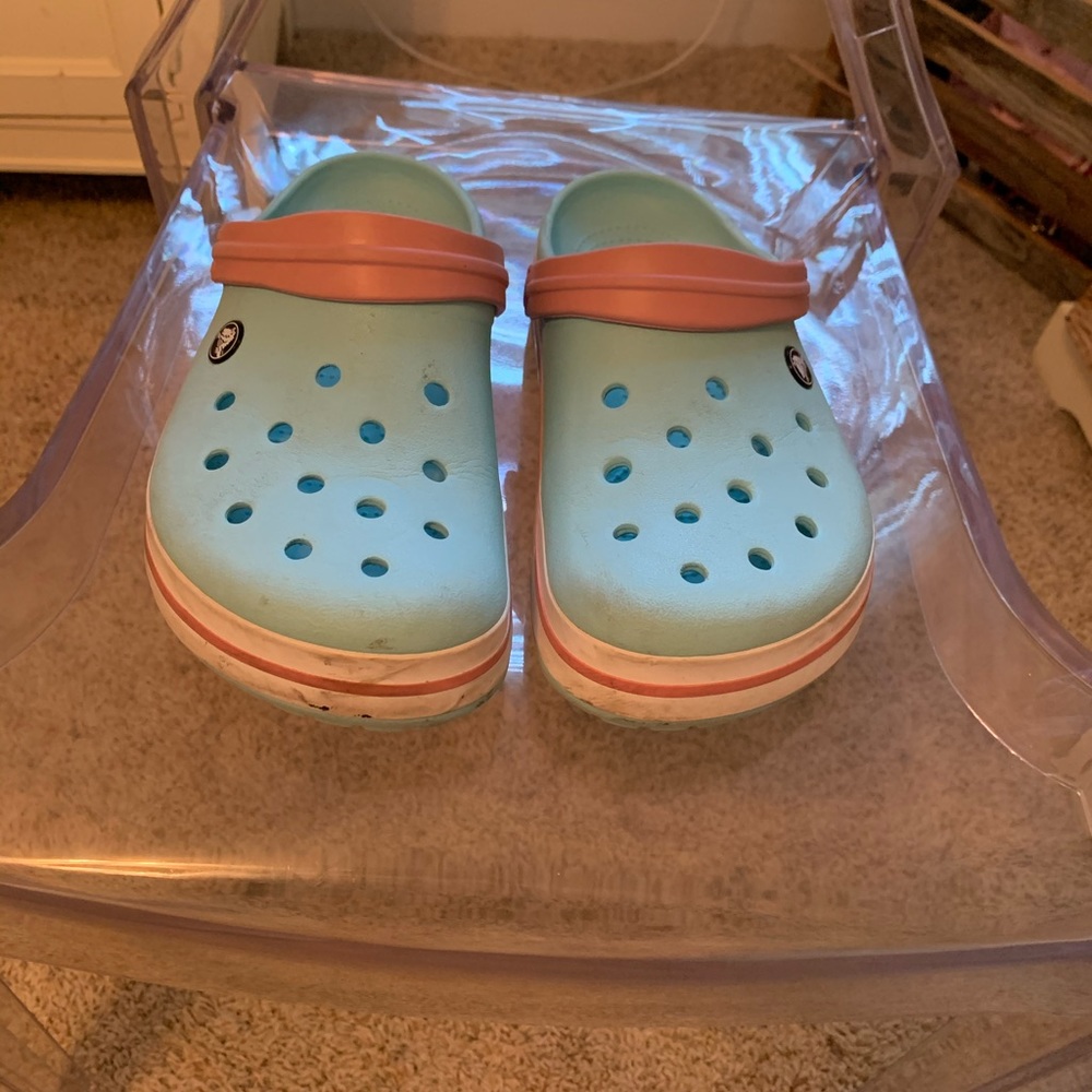 Blue and pink crocs